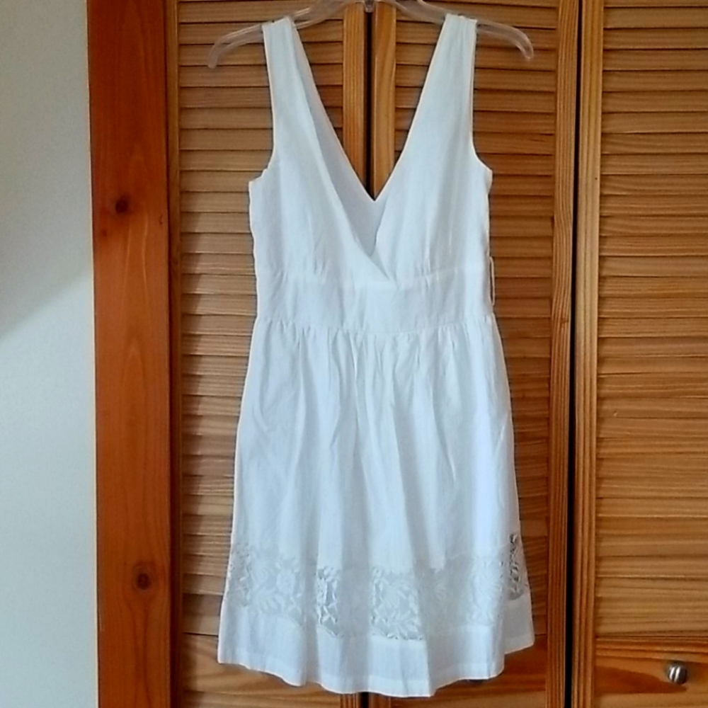 White Dress with lace trim.